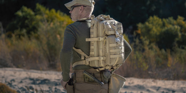 A real Maxpedition user carries his Falcon-II Backpack, which features a CCW Compartment